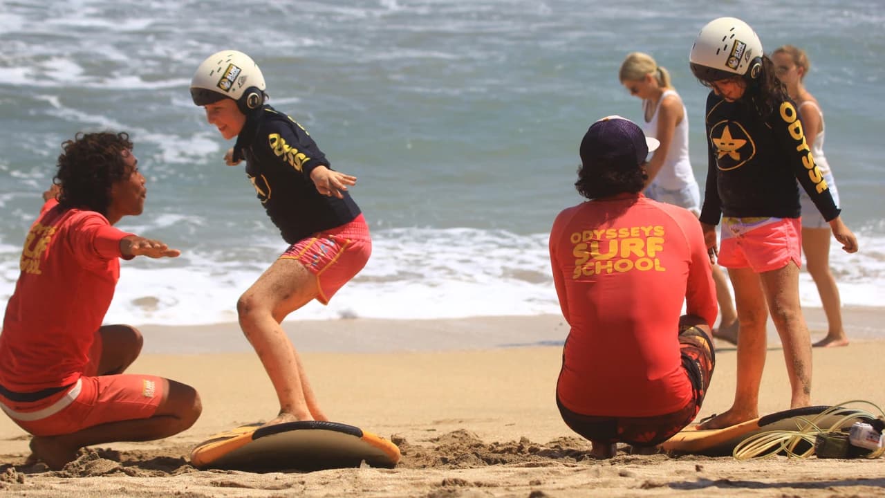 Surfing Lessons by Odysseys Surf School